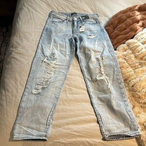 Express boyfriend mid rise distressed jeans. NWT